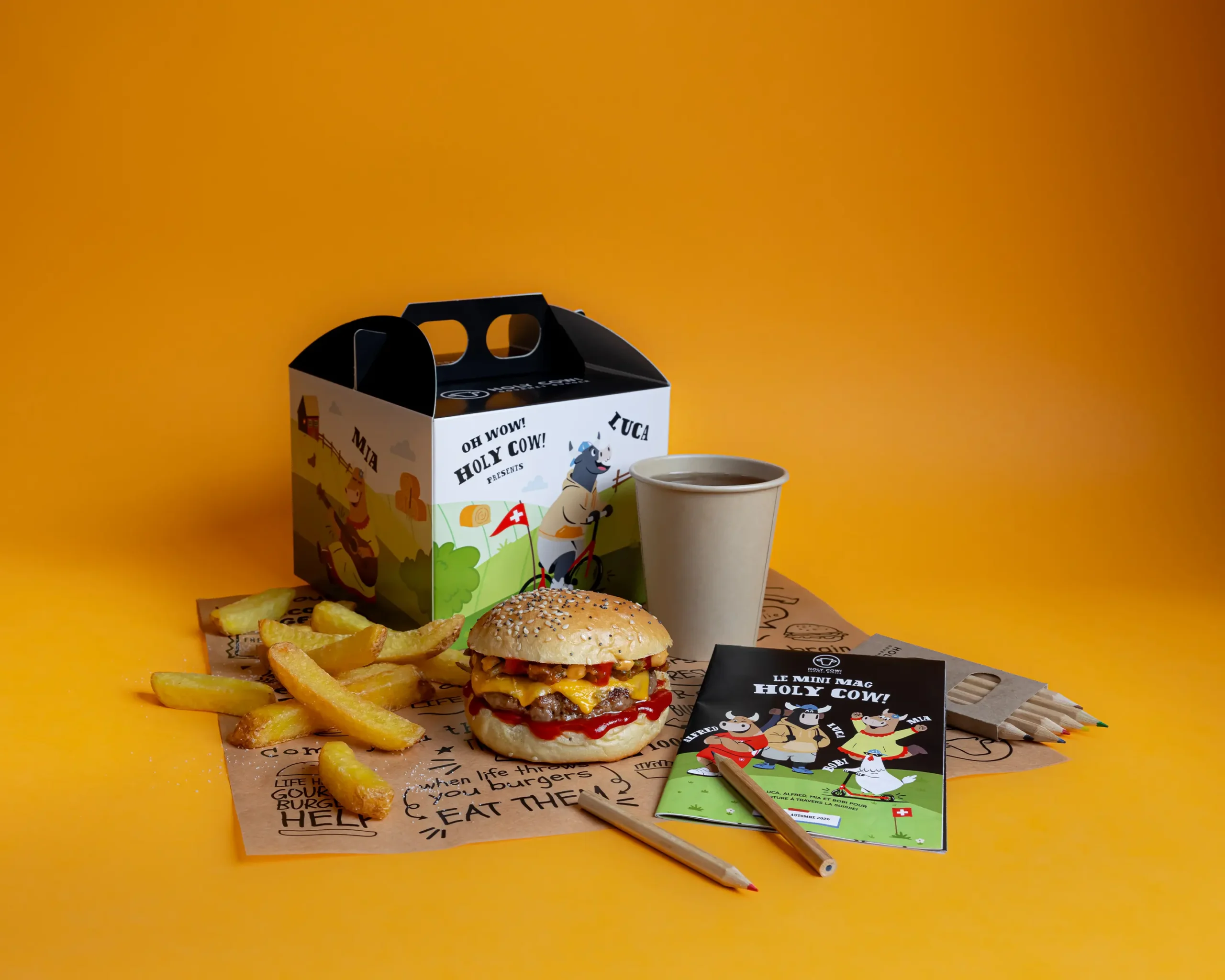 Menu Kids Holy Cow! avec burger, frites suisses, boisson et Mini Mag